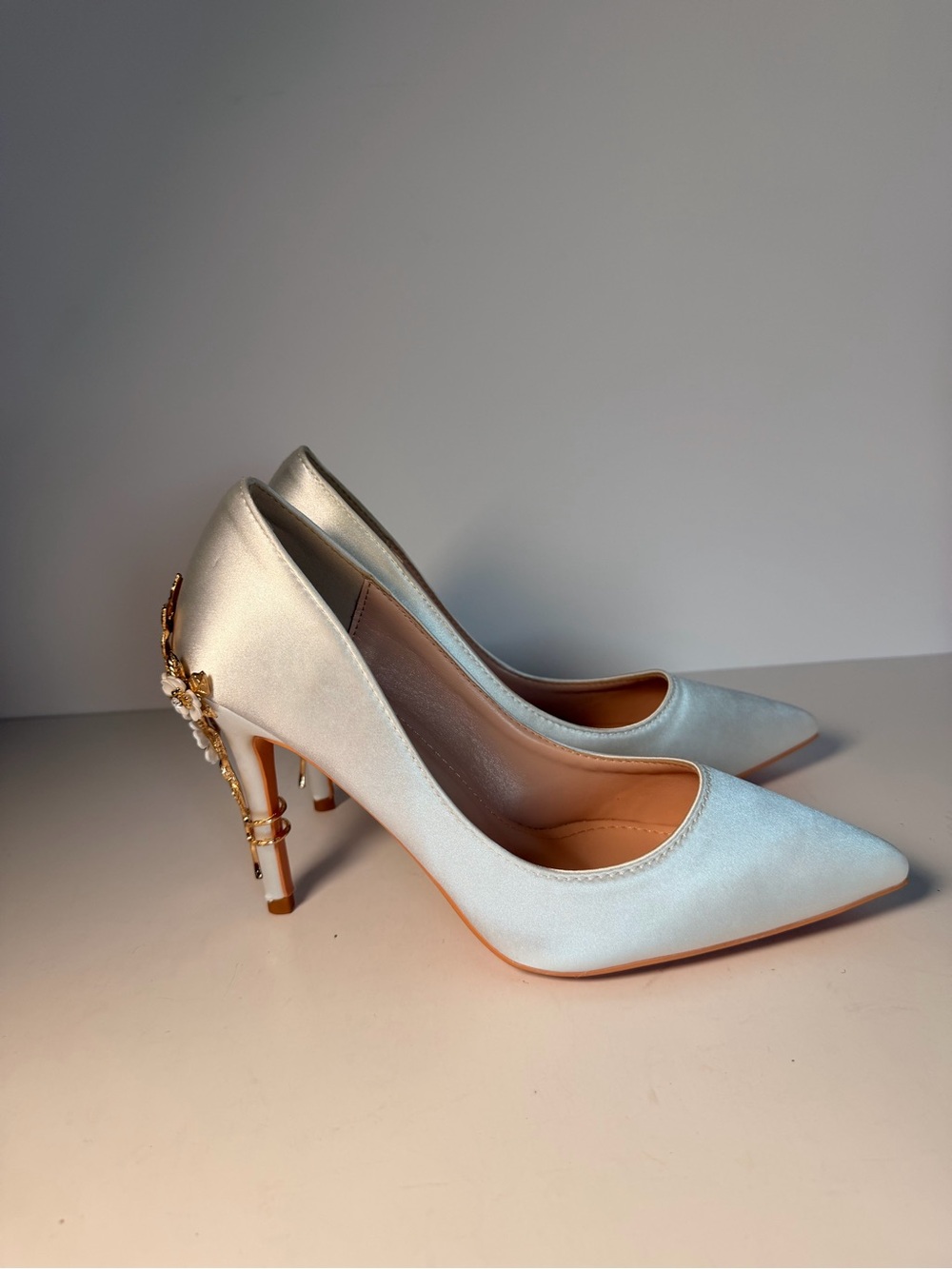 Ivory Satin Pointed-Toe Stiletto Pumps with Gold Embellished Heel